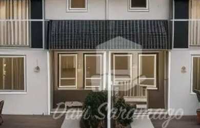 Imagem: A casa possui 2 Dormitórios, 3 Banheiros, 1 Vaga na garagem