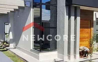 Imagem: A casa possui 3 Dormitórios, 3 Banheiros, 4 Vagas na garagem