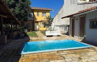 Imagem: A casa à venda possui 3 Dormitórios, 4 Banheiros, 3 Vagas