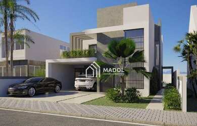 Imagem: A casa possui 3 Dormitórios, 4 Banheiros, 4 Vagas na garagem