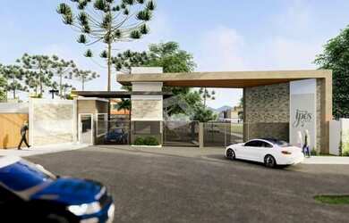 Imagem: A casa possui 3 Dormitórios, 5 Banheiros, 2 Vagas na garagem