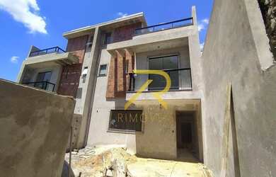 Imagem: A casa possui 3 Dormitórios, 2 Banheiros, 2 Vagas na garagem