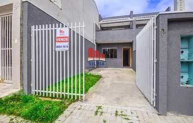 Imagem: A casa possui 3 Dormitórios, 2 Banheiros, 2 Vagas na garagem