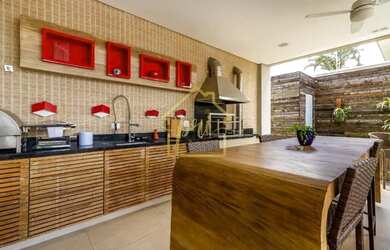 Imagem: A casa possui 5 Dormitórios, 5 Banheiros, 5 Vagas na garagem