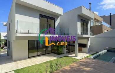 Imagem: A casa em condomínio possui 4 Dormitórios, 5 Banheiros, 4