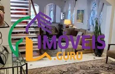 Imagem: A casa possui 3 Dormitórios, 5 Banheiros, 4 Vagas na garagem