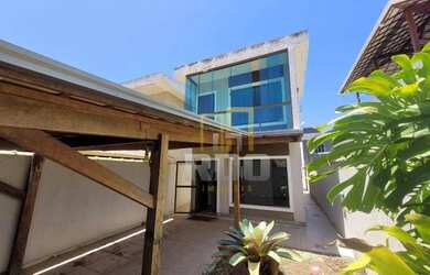 Imagem: A casa possui 3 Dormitórios, 3 Banheiros, 2 Vagas na garagem