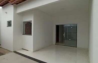 Imagem: A casa possui 3 Dormitórios, 2 Banheiros, 2 Vagas na garagem