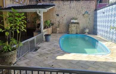 Imagem: A casa em condomínio possui 3 Dormitórios, 4 Banheiros, 3