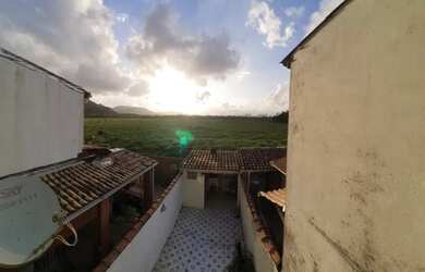 Imagem: A casa possui 2 Dormitórios, 3 Banheiros, 2 Vagas na garagem