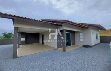 Imagem: A casa possui 2 Dormitórios, 3 Banheiros, 2 Vagas na garagem