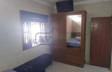 Imagem: A casa possui 2 Dormitórios, 3 Banheiros, 3 Vagas na garagem