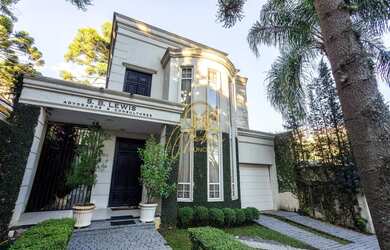 Imagem: A casa possui 5 Dormitórios, 5 Banheiros, 3 Vagas na garagem