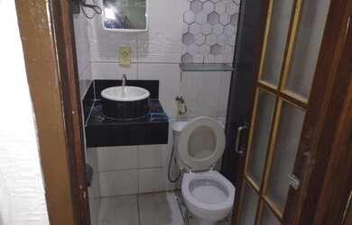 Imagem: A casa possui 2 Dormitórios, 3 Banheiros, 1 Vaga na garagem