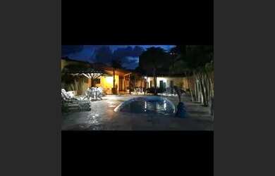 Imagem: A casa possui 3 Dormitórios, 4 Banheiros, 3 Vagas na garagem