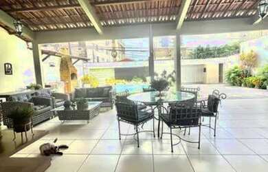 Imagem: A casa possui 4 Dormitórios, 5 Banheiros, 5 Vagas na garagem