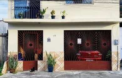 Imagem: A casa possui 3 Dormitórios, 2 Banheiros, 1 Vaga na garagem