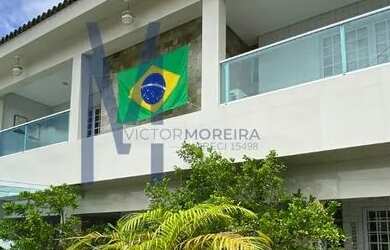 Imagem: A casa possui 3 Dormitórios, 5 Banheiros, 2 Vagas na garagem