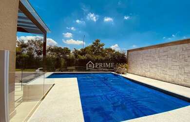 Imagem: A casa em condomínio possui 4 Dormitórios, 5 Banheiros, 5