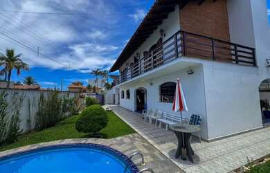 Imagem: A casa possui 3 Dormitórios, 5 Banheiros, 5 Vagas na garagem