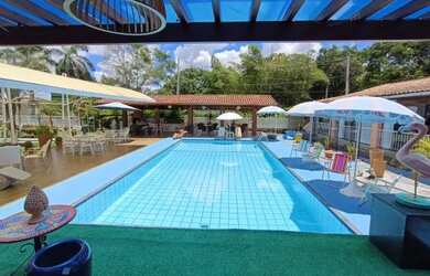 Imagem: A casa em condomínio possui 4 Dormitórios, 4 Banheiros, 3