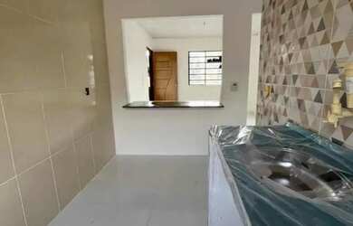 Imagem: A casa possui 2 Dormitórios, 2 Banheiros e está localizado