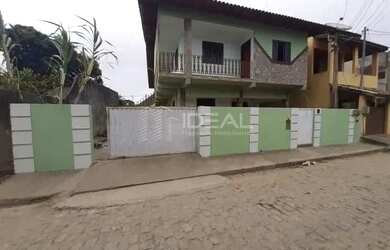 Imagem: A casa possui 2 Dormitórios, 2 Banheiros, 3 Vagas na garagem