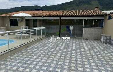 Imagem: A casa possui 3 Dormitórios, 3 Banheiros, 3 Vagas na garagem