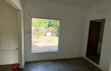 Imagem: A casa possui 2 Dormitórios, 1 Banheiro, 3 Vagas na garagem