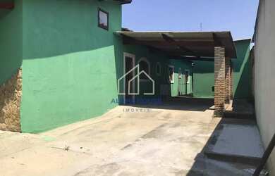 Imagem: A casa possui 2 Dormitórios, 2 Banheiros, 3 Vagas na garagem