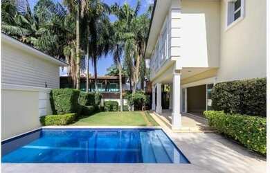 Imagem 6: Zona Sul condomínio de sobrados de alto padrão, com 4 suítes,4 salas,5 vagas, útil de 627m