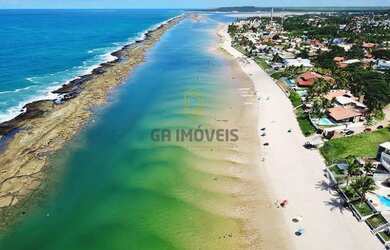 Imagem: A casa possui 4 Dormitórios, 4 Banheiros, 5 Vagas na garagem