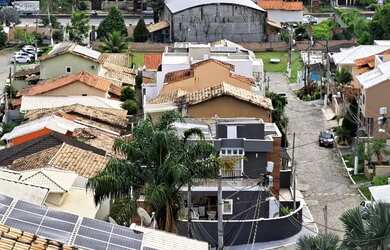 Imagem: A casa em condomínio possui 4 Dormitórios, 3 Banheiros, 3