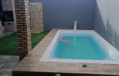 Imagem: A casa possui 2 Dormitórios, 3 Banheiros, 2 Vagas na garagem