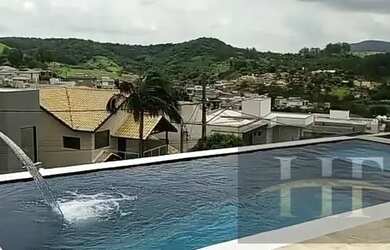 Imagem: A casa em condomínio possui 3 Dormitórios, 4 Banheiros, 4