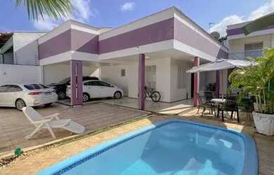 Imagem: A casa possui 3 Dormitórios, 4 Banheiros, 4 Vagas na garagem