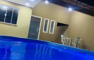 Imagem: A casa possui 4 Dormitórios, 2 Vagas na garagem e está localizado