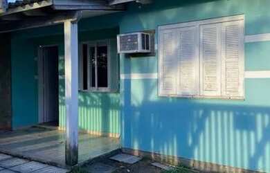 Imagem: A casa possui 2 Dormitórios, 1 Banheiro e está localizado