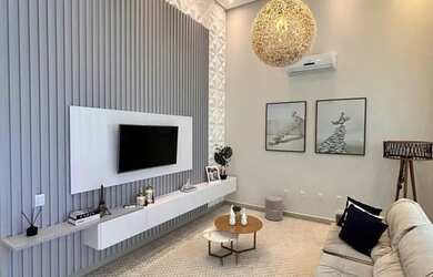 Imagem: A casa possui 3 Dormitórios, 4 Banheiros, 3 Vagas na garagem