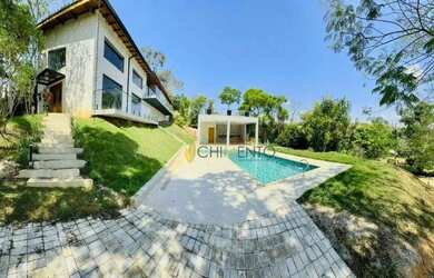 Imagem: A casa em condomínio possui 4 Dormitórios, 5 Banheiros, 5