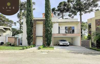 Imagem: A casa possui 3 Dormitórios, 4 Banheiros, 2 Vagas na garagem