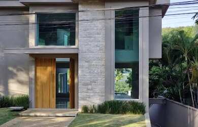 Imagem: A casa em condomínio possui 5 Dormitórios, 5 Banheiros, 5