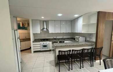 Imagem 4: Apartamento térreo, pé na areia, 03 suítes, sala com varanda, cozinha planejada, área laze