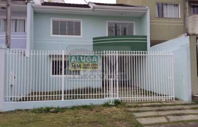 Imagem: A casa possui 3 Dormitórios, 2 Banheiros, 2 Vagas na garagem