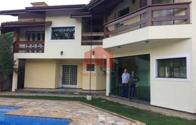 Imagem: A casa possui 3 Dormitórios, 4 Banheiros, 4 Vagas na garagem