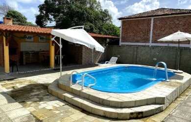 Imagem: A casa possui 3 Dormitórios, 3 Vagas na garagem e está localizado