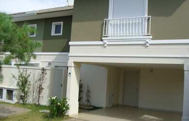 Imagem: A casa possui 3 Dormitórios, 5 Banheiros, 3 Vagas na garagem