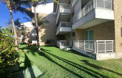 Imagem 2: Apartamento térreo, pé na areia, 03 suítes, sala com varanda, cozinha planejada, área laze