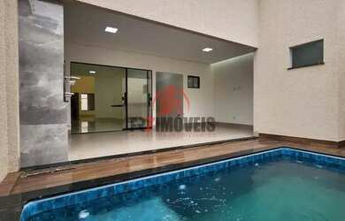 Imagem: A casa possui 3 Dormitórios, 2 Banheiros, 2 Vagas na garagem