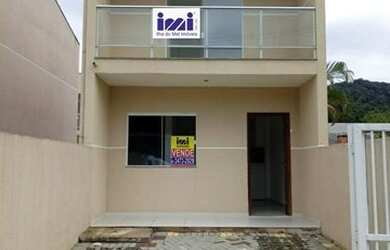 Imagem: A casa possui 2 Dormitórios, 1 Banheiro, 1 Vaga na garagem